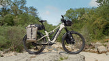 Amflow TL Carbon loaded with panniers on rocky terrain